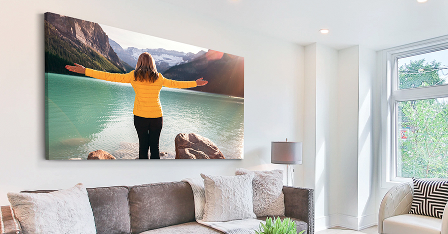 Canvas Print of girl enjoying sea side